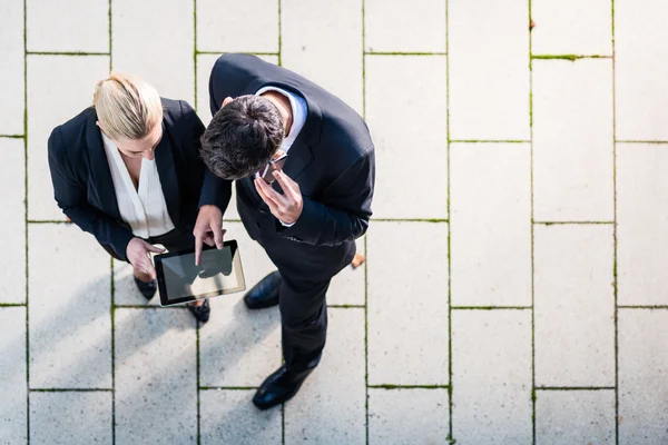 Business man and woman in top view — Stock Photo, Image