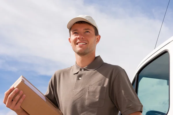 Postdienst - Zustellung eines Pakets — Stockfoto