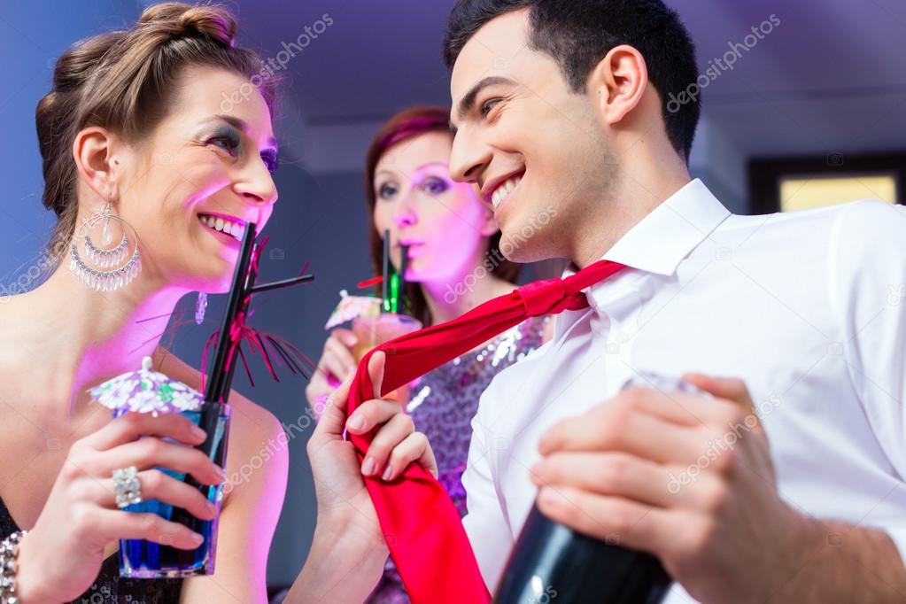 Woman flirting with barkeeper