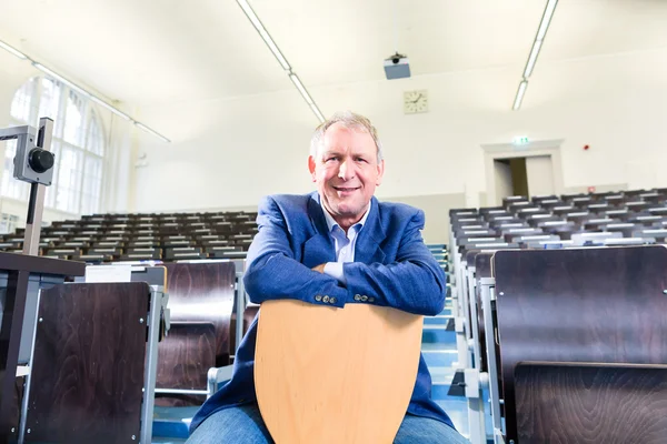 College professor in auditorium