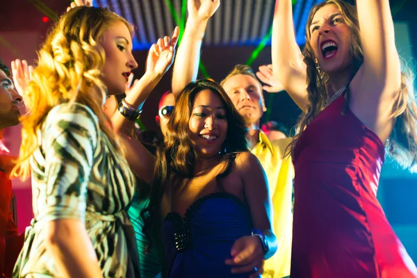 Festa persone che ballano in discoteca o club Foto Stock Royalty Free