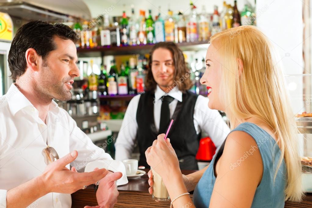 Attractive couple in cafe or coffeeshop