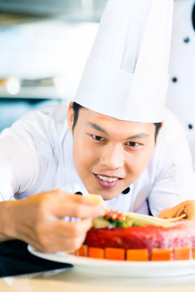 Asian chefs cooking in Restaurant — Stock Photo, Image