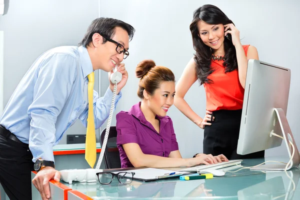 Office team working hard for a business success — Stock Photo, Image