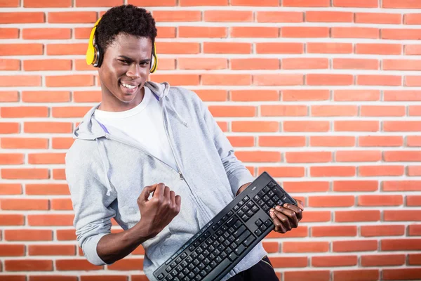 Hacker or computer programmer with laptop — Stock Photo, Image