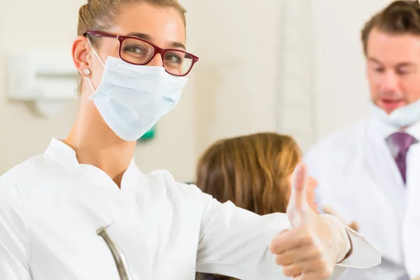 Dentist in her surgery — Stock Photo, Image