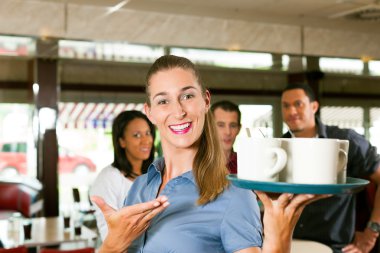 Kadın garson, bir bar veya restoran olarak