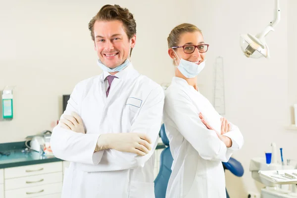 Dentists in their surgery — Stock Photo, Image