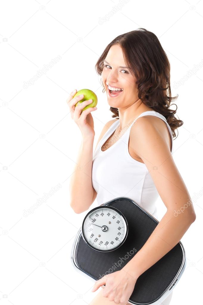 woman with scale under her arm and apple