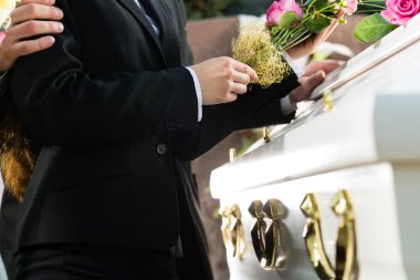 Mourning People at Funeral with coffin clipart