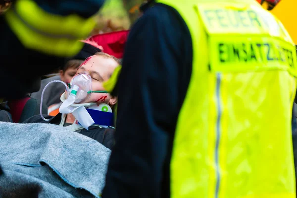 Accident - Fire brigade, Victim with respirator — Stock Photo, Image