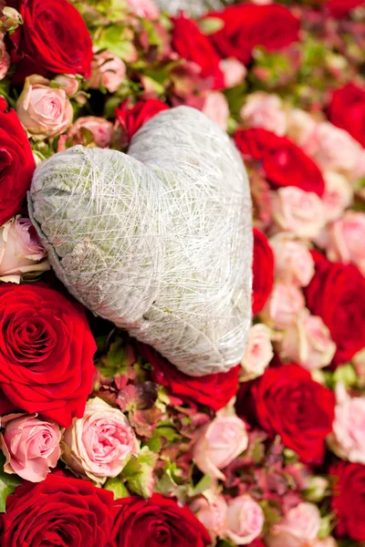 Flowers and heart decoration — Stock Photo, Image