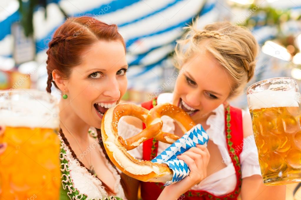Women with traditional Bavarian clothes in beer tent