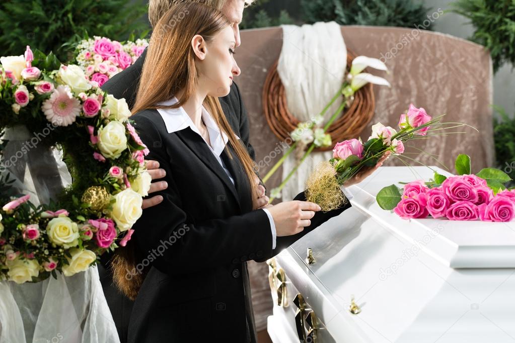 Mourning People at Funeral with coffin