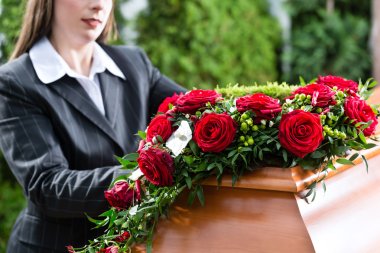 Mourning Woman at Funeral with coffin clipart