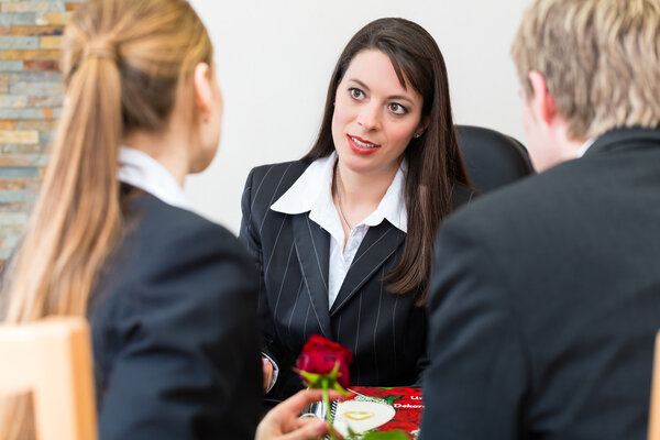 mortician with client comforting and advising