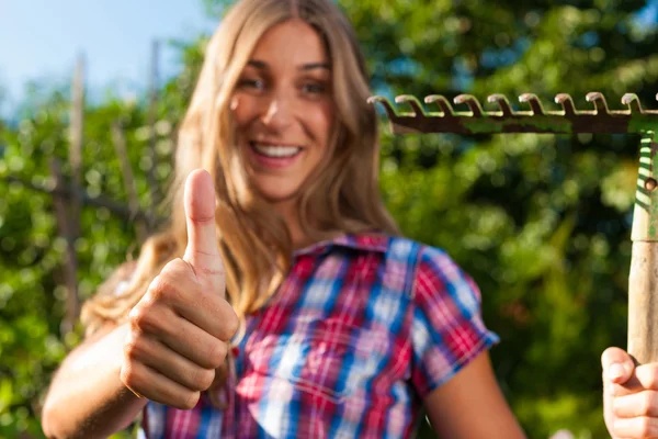 Gardening in summer - woman with grate — Stock Photo, Image