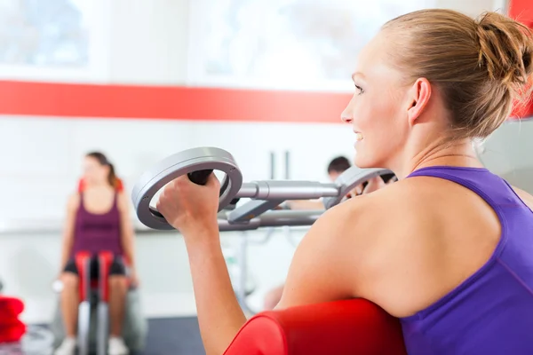 Gym people doing strength or sports training — Stock Photo, Image