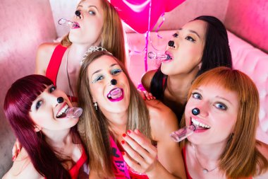 Women having bachelorette party in night club clipart