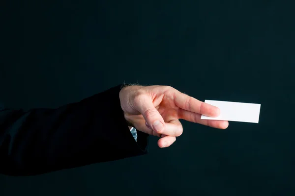 Businessman hand over business card — Stock Photo, Image