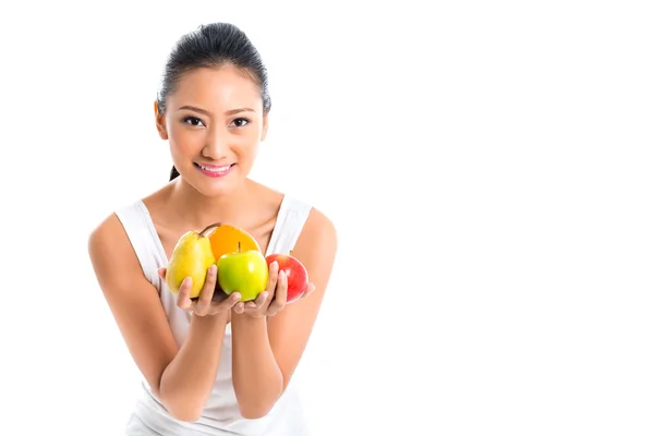 Asian woman offering healthy fruits — Stock Photo, Image