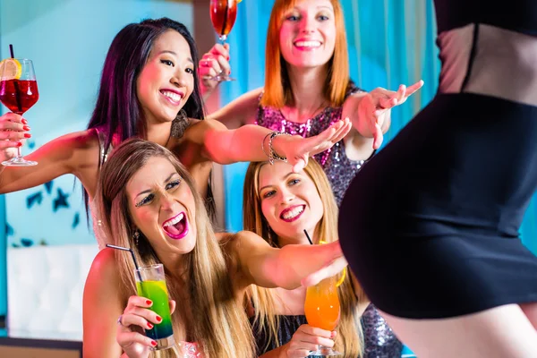 Drunk women with fancy cocktails in strip club — Stock Photo, Image