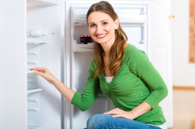 Housekeeper with Refrigerator clipart