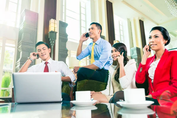 Asian businesspeople having meeting — Stock Photo, Image