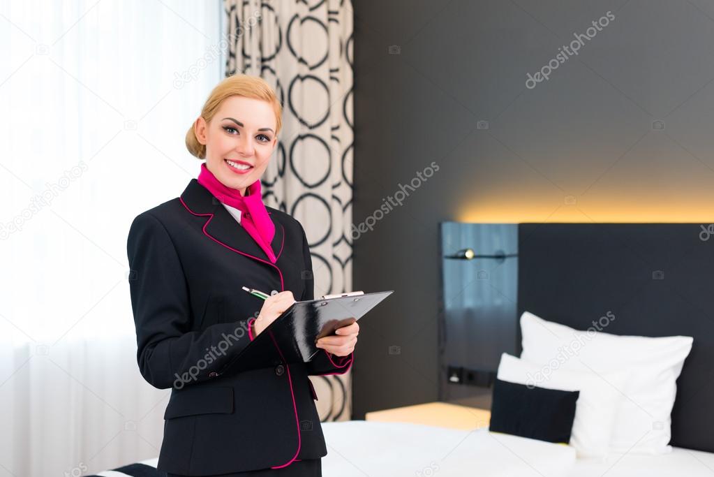 Housekeeper checking hotel room