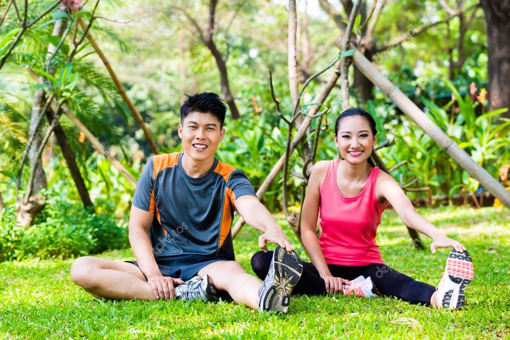 Uncut asian couple outdoor
