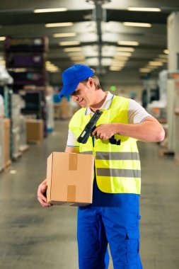 worker scans package in warehouse of forwarding clipart