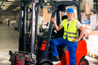 forklift driver at warehouse of forwarding clipart