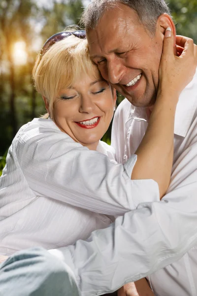 Senior couple in spring outdoors — Stock Photo, Image