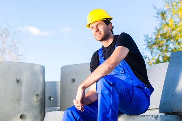 Builder of construction site with canalization project — Stock Photo, Image