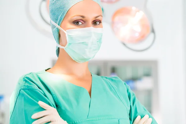 Hospital - doctor surgeon in operation theater — Stock Photo, Image