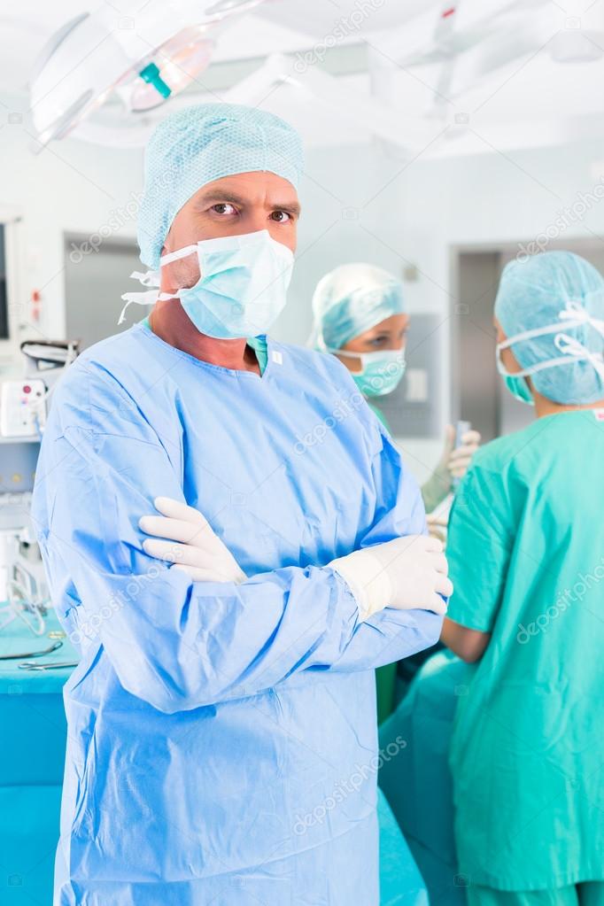 Hospital surgeons operating in operation room