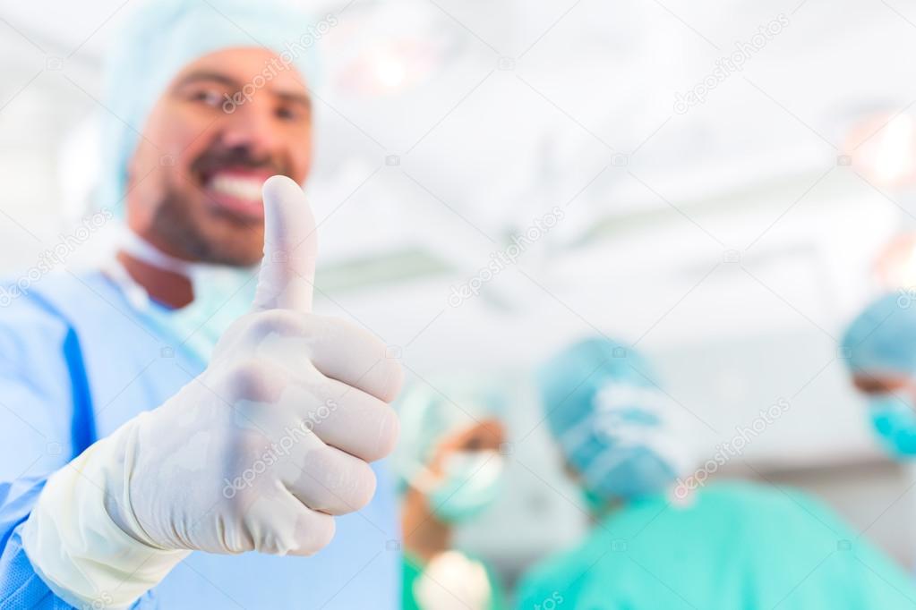 Hospital surgeons operating in operation room