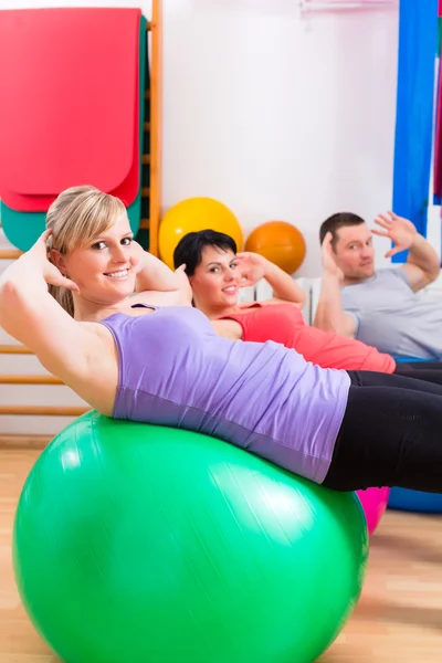 Patients at physiotherapy on training balls — Stock Photo, Image