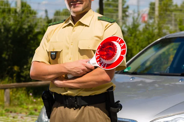 Stoppen met politie - politieman of cop auto — Stockfoto