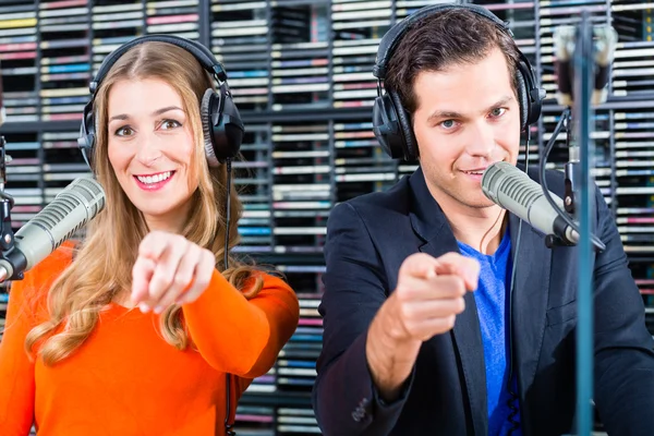 Radio presenters in radio station on air — Stock Photo, Image
