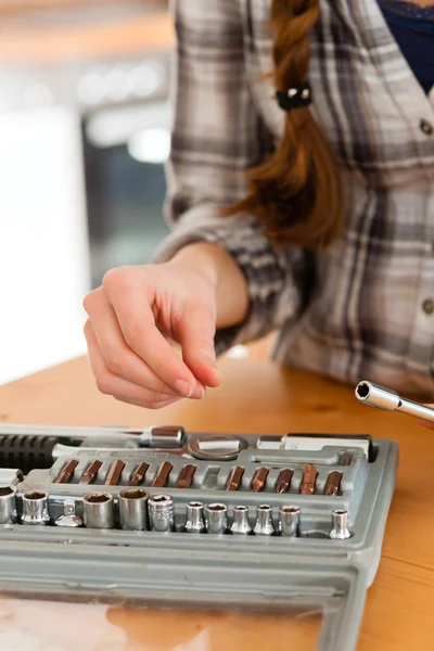 Woman with toolbox and screwdriver — Stock Photo, Image