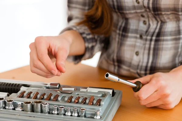 Woman with toolbox and screwdriver — Stock Photo, Image