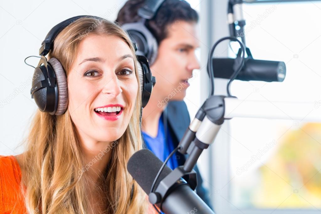 radio presenters in radio station on air