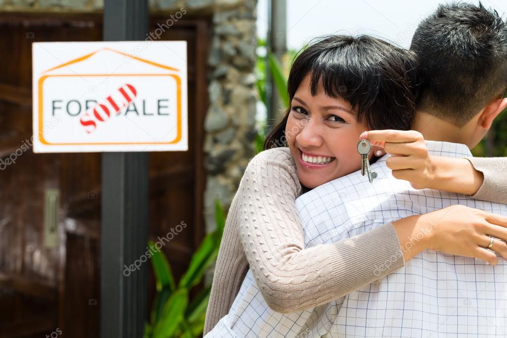 Asian couple looking for real estate