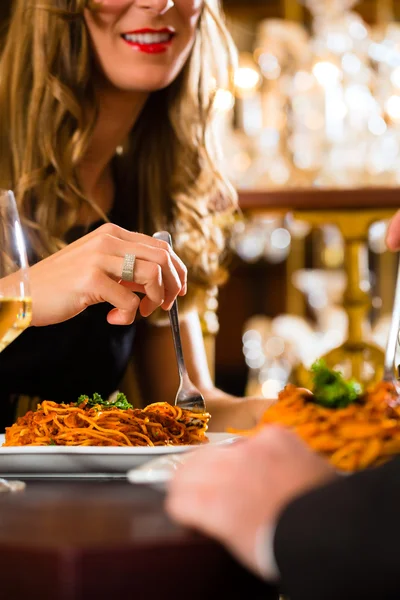 Happy couple have a romantic date in restaurant — Stockfoto