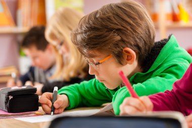 Pupils at school doing their homework