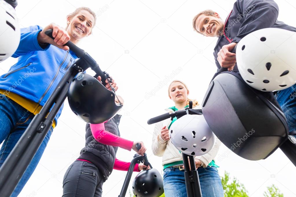 Tourist group having guided Segway city tour