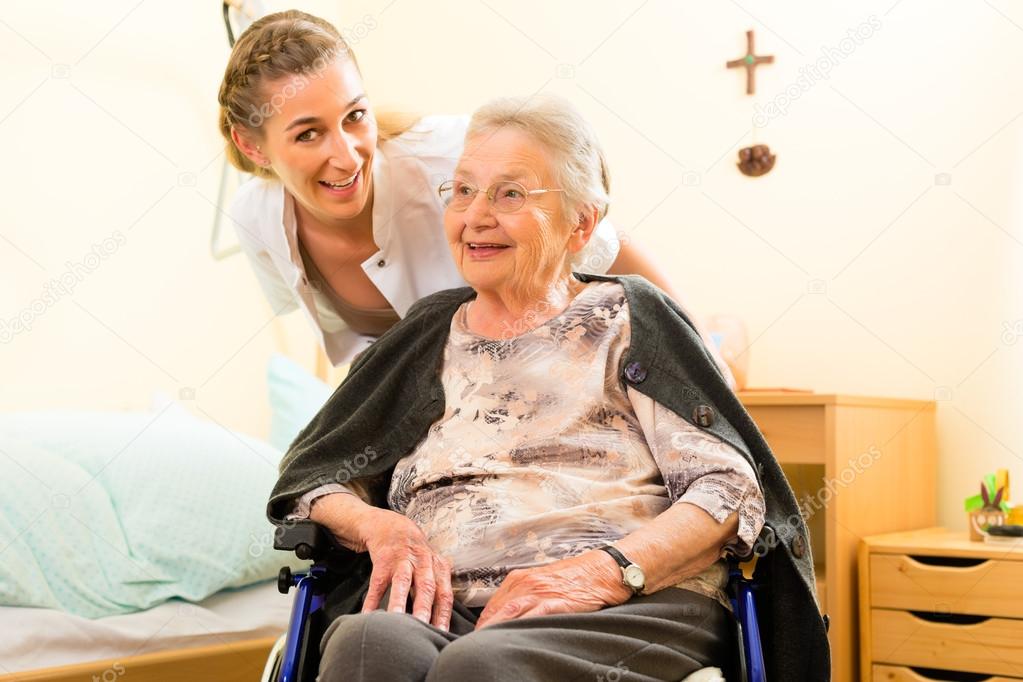 nurse and female senior in nursing home