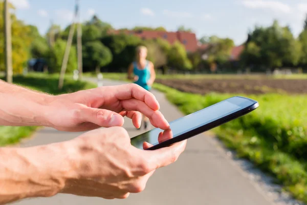 Couple running, sport jogging on rural street — Stock Photo, Image