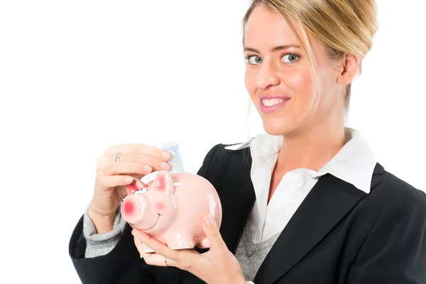 Saving  money, woman with a piggy bank — Stock Photo, Image